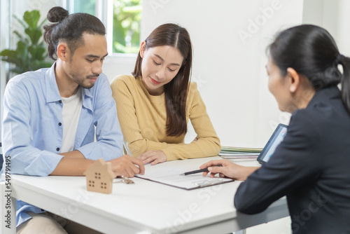 Happy asian couple client, tenant buyer home ,apartment, sign signature contract rental, purchase. Landlord, realtor agreement after bank approve mortgage, loan success or done. Property agent concept