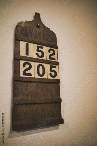 Wooden hymn board with hymn numbers