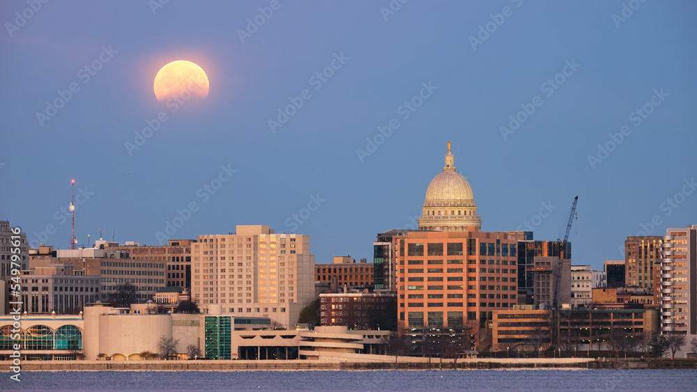 Lunar eclipse behind the skyline of Madison, WI. 