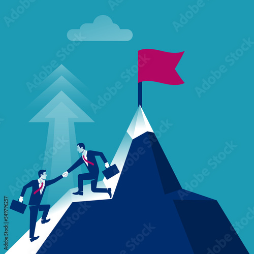 Teamwork concept. Two businessmen together rise on mountain with flag. Give help hand. Collaboration concept. Vector flat design. Isolated on background. Business people work together to achieve goal