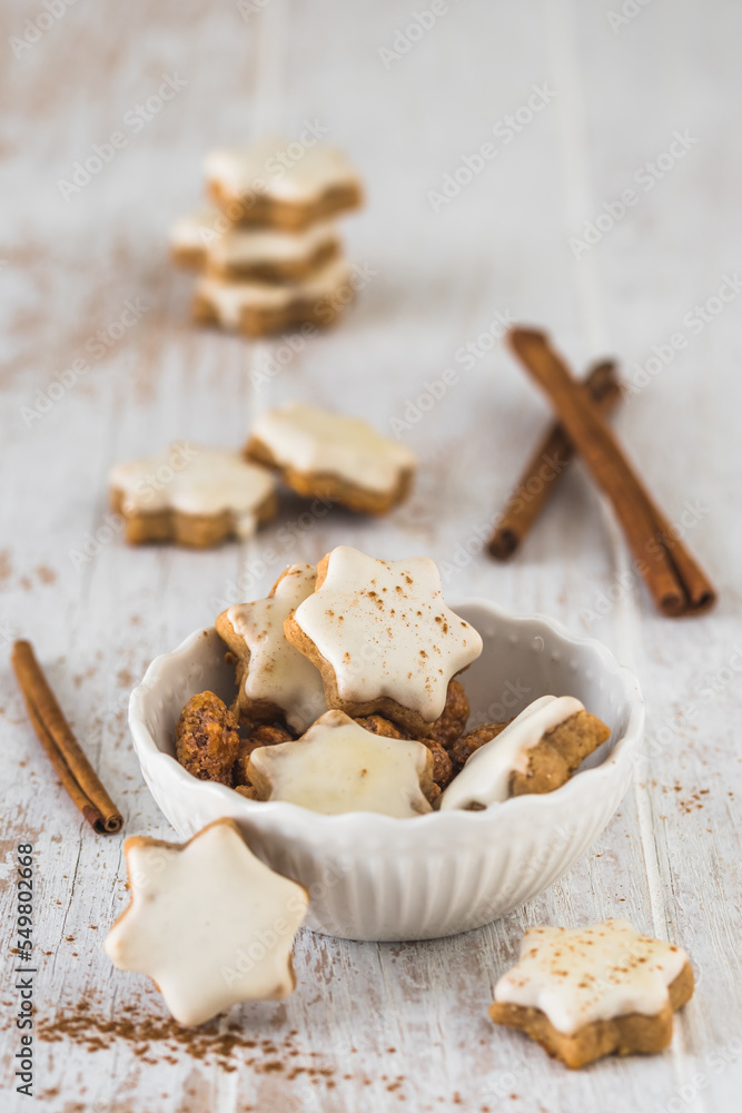 Christmas cinnamon star cookies on a wooden table Christmas cinnamon star cookies on a wooden table