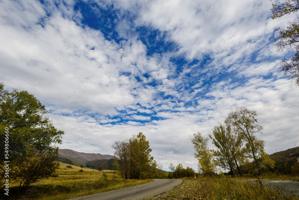 Fabulous autumnal scene with trees and cloudy sky, Armenia Fabulous autumnal scene with trees and cloudy sky, Armenia