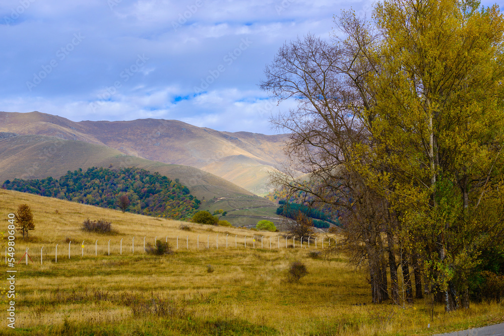 Fabulous autumn landscape with trees and mountains, Armenia Fabulous autumn landscape with trees and mountains, Armenia