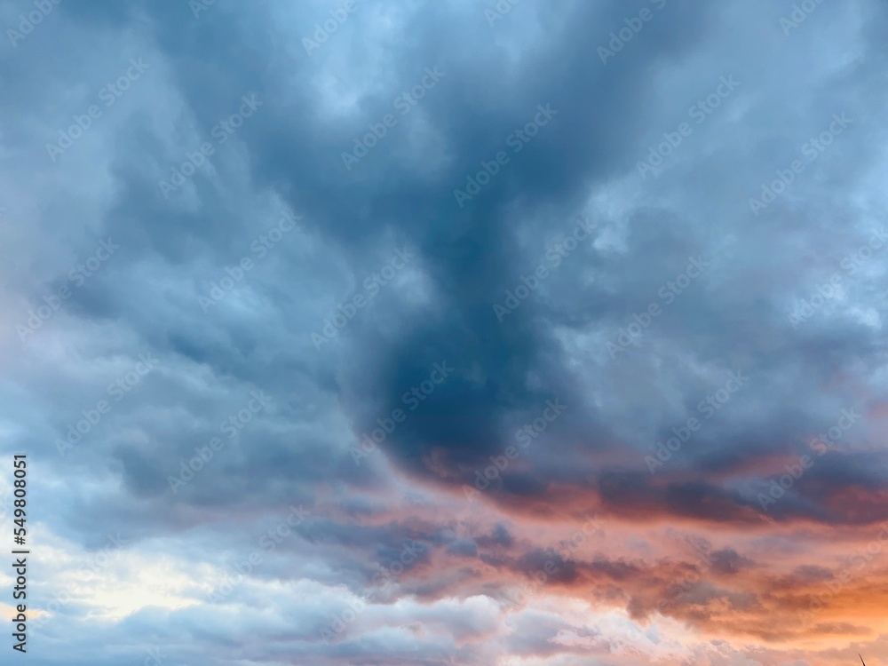 Dark cloudy heavens, sunrise cloudy sky, fluffy clouds Dark cloudy heavens, sunrise cloudy sky, fluffy clouds