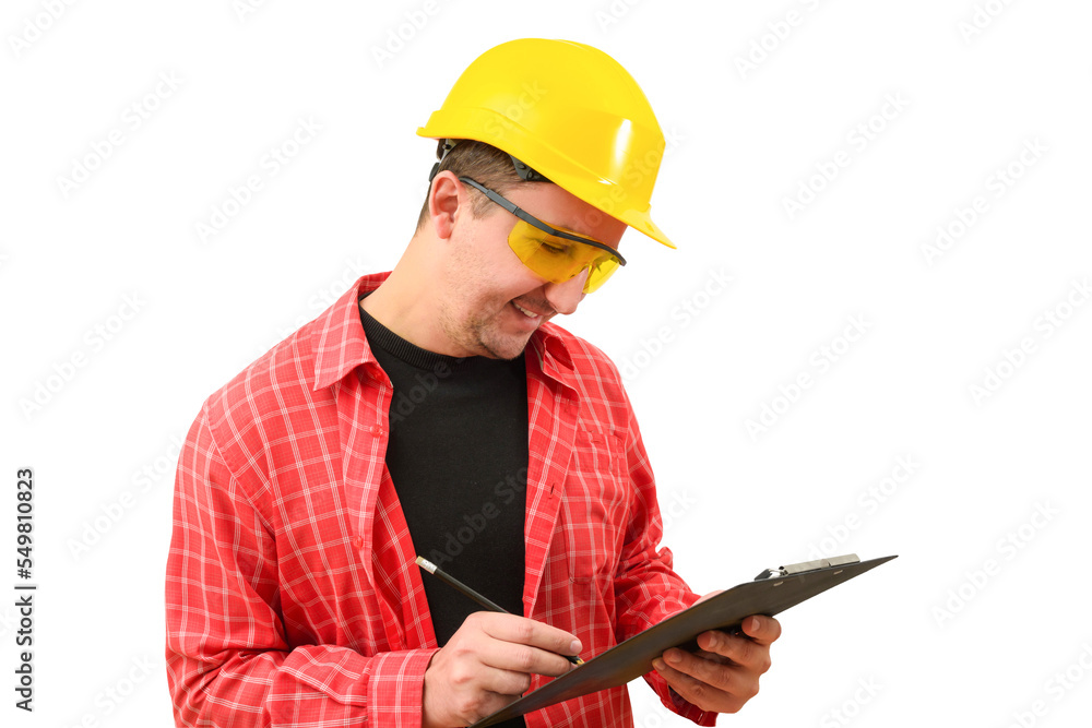 Male builder in a construction helmet and a contract in his hands on a white background. Construction, development, teamwork Male builder in a construction helmet and a contract in his hands on a white background. Construction, development, teamwork