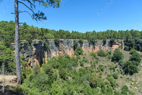 Torcas de Palancares and Tierra Muerta natural monument makes up a rugged area with hiking routes amid karst rock formations, pine forest & sinkholes, Cuenca, Spain photo