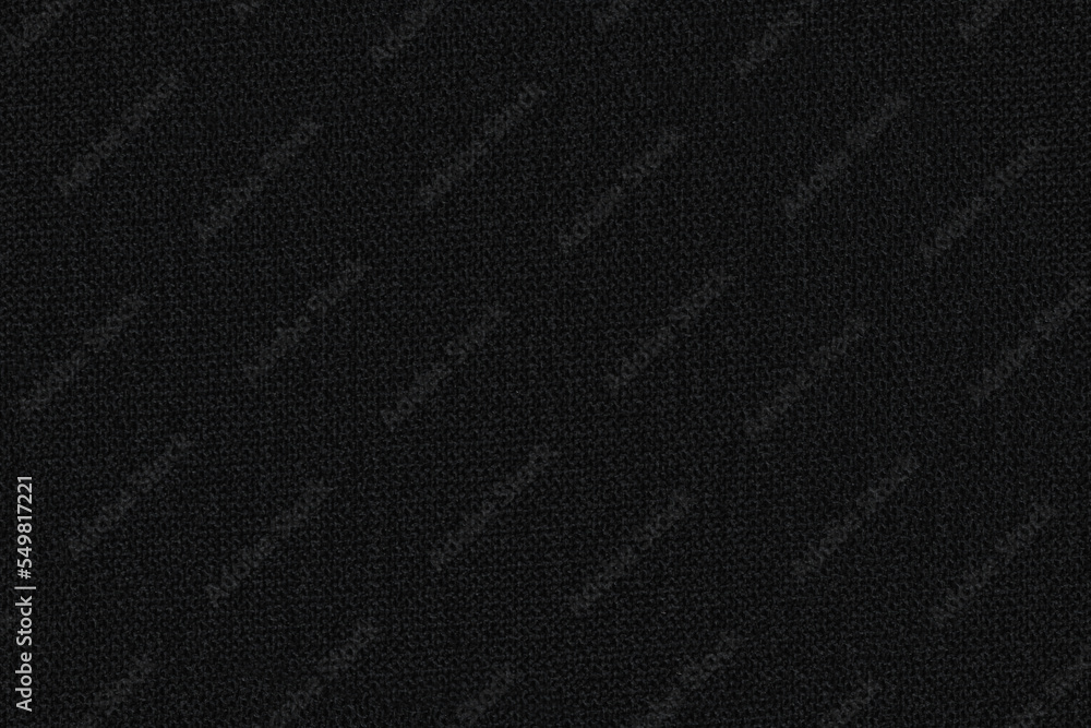 Black textile fabric, closeup macro detail made into seamless tileable pattern, image width 20cm