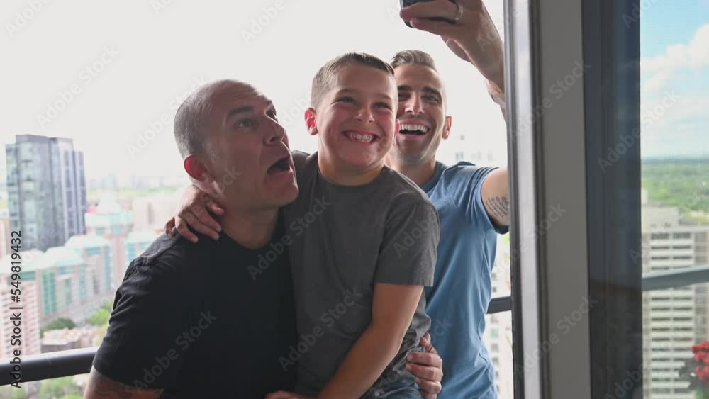 Male couple family son take selfie. Male couple family son take selfie.