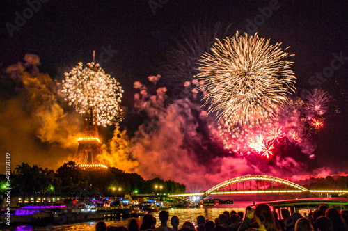 Fireworks over the Seine in Paris, France on Bastille Day.