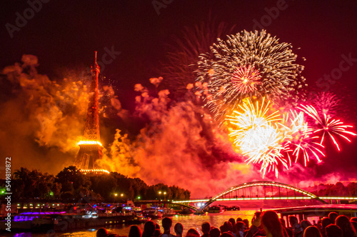 Fireworks over the Seine in Paris, France on Bastille Day. photo