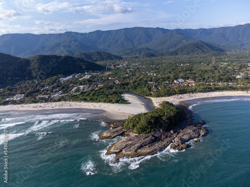 beautiful beach in the middle of the mountains and flows into the river at sunset