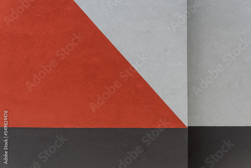 Minimalist abstract wallpaper with simple lines in red and grey, close up of a wall