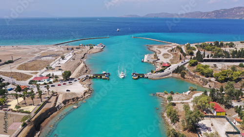 Obraz na plátně Aerial drone photo of yacht crossing narrow Corinth canal of Isthmus from West s