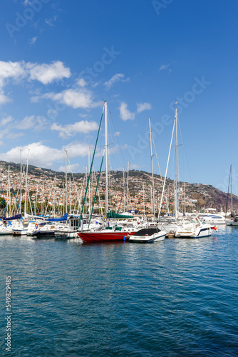 Marina with boats in Funchal on Madeira island portrait format in Portugal