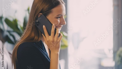 Happy young woman answering smartphone call, communication and good news
