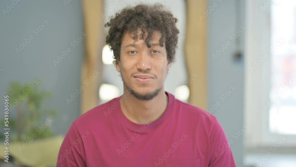 Portrait of African Man Smiling at Camera Portrait of African Man Smiling at Camera