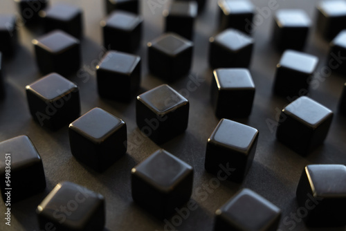 Vászonkép Black blocks on a dark background