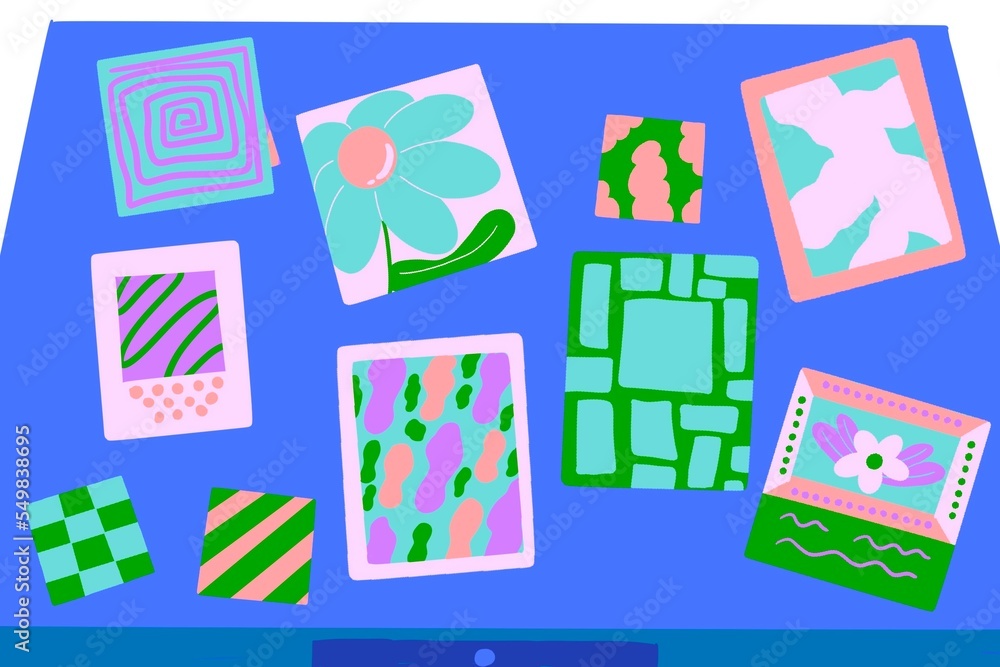 display of graphic drawings on a desk in a studio display of graphic drawings on a desk in a studio