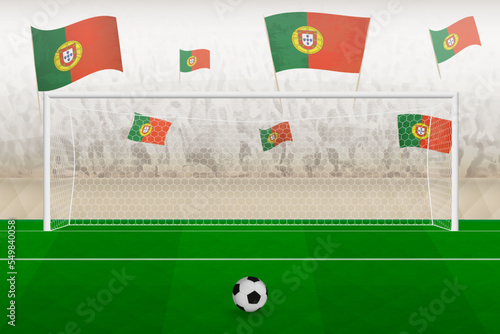 Portugal football team fans with flags of Portugal cheering on stadium, penalty kick concept in a soccer match.