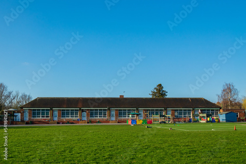British Junior school playground & infant school playing fields on a sunny day photo