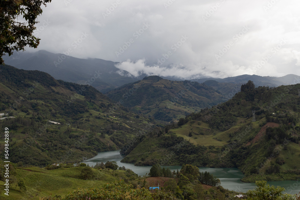 Beautiful cloudy mountains landscape of colombian guavio region 