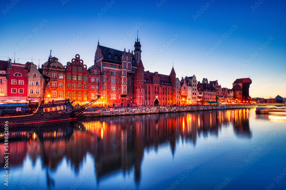 Illuminated Gdansk Old Town with Calm Motlawa River at Dusk, Poland