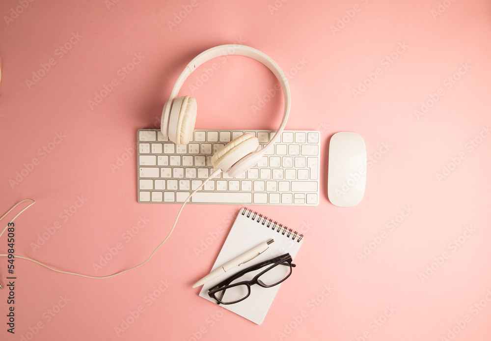 Headphones, keyboard and notepad Headphones, keyboard and notepad