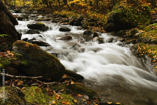 Waterfall surrounded by rocks, Waterbury, Vermont, USA photo
