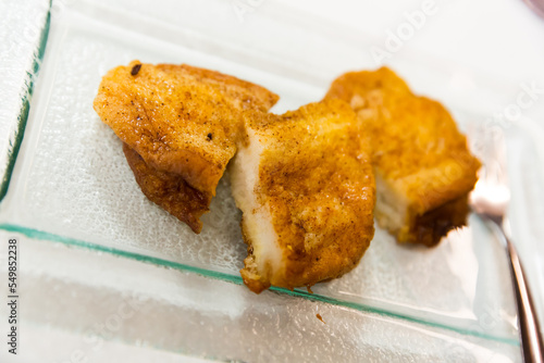 Delicious Madrilian torrijas - traditional Spanish dish from bread soaked in milk or wine with honey and spices..