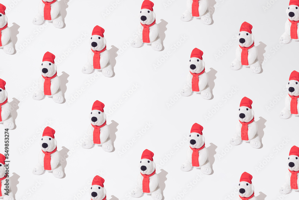 Plush polar bear pattern. White background. Copy space. Plush polar bear pattern. White background. Copy space.