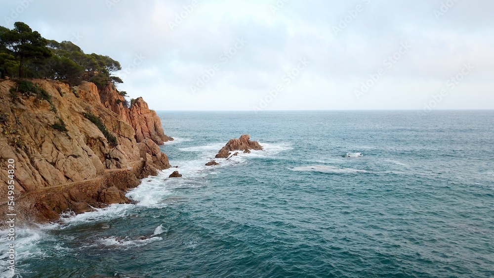 aerial view of the typical landscape of Costa Brava with cliffs at the sea that gives its name, aerial view of the typical landscape of Costa Brava with cliffs at the sea that gives its name,