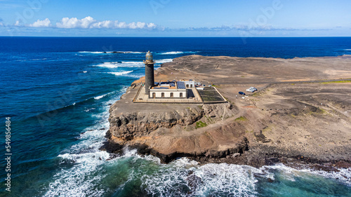 Aerial view of the lighthouse of Punta Jandia at the southermost tip of Fuerteventura in the Canary Islands, Spain - Completed in 1864, it is one of the oldest lighthouses in the Canaries photo