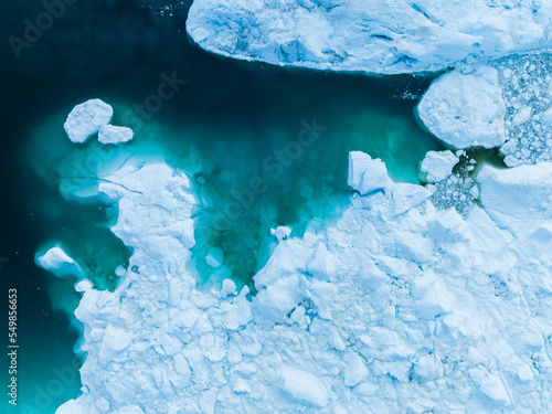 detail of extreme icebergs from aerial view in cenital photo