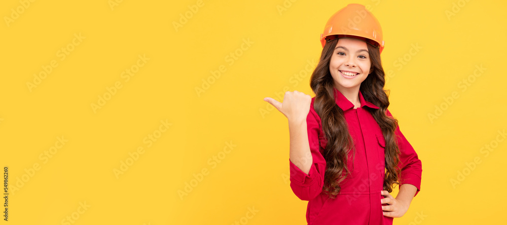 Architect teenager girl. child wear helmet for building. protection and safety. kid education. on construction site. Child builder in helmet horizontal poster design. Banner header, copy space. Architect teenager girl. child wear helmet for building. protection and safety. kid education. on construction site. Child builder in helmet horizontal poster design. Banner header, copy space.