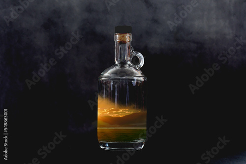 Sunset in a transparent bottle with a black background