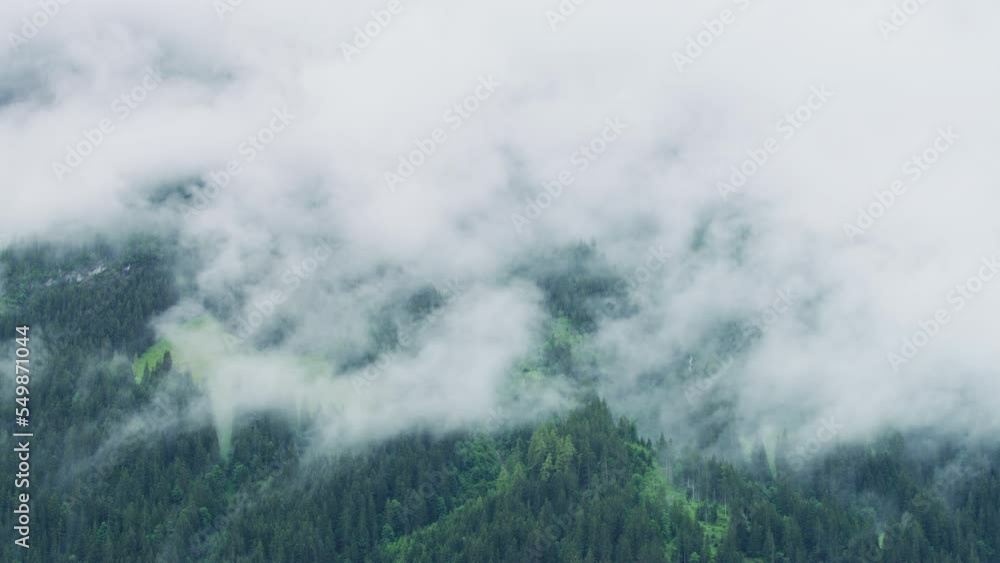 Timelapse of a hill shrouded in clouds, Switzerland Timelapse of a hill shrouded in clouds, Switzerland