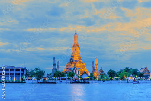 wat arun pagoda on Chao Phraya river bank in Bangkok Thailand