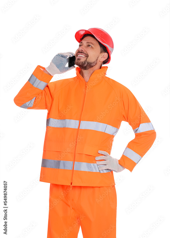 Man in reflective uniform talking on phone against white background Man in reflective uniform talking on phone against white background