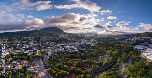 Aerial view of a big mountain at sunset. The beautiful city of Tuxtla Gutierrez in Mexico. Panorama. photo