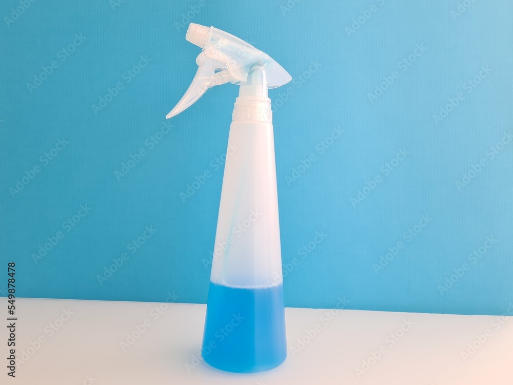 Window cleaner in a plastic spray bottle Window cleaner in a plastic spray bottle