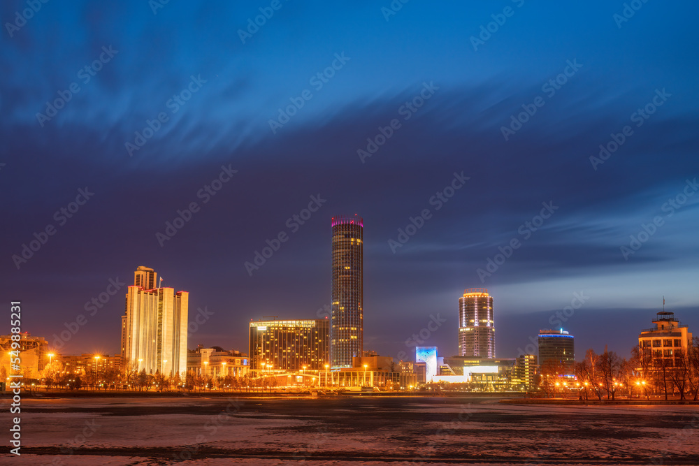Yekaterinburg city with Buildings of Regional Government and Parliament, Dramatic Theatre, Iset Tower, Yeltsin Center, panoramic view at Early Spring night