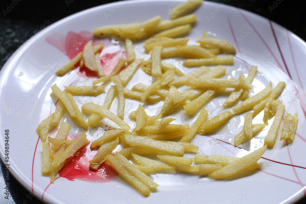 Close up of Frying french fries in the fryer in hot oil, Junk food concept, Close up of Frying french fries in the fryer in hot oil, Junk food concept