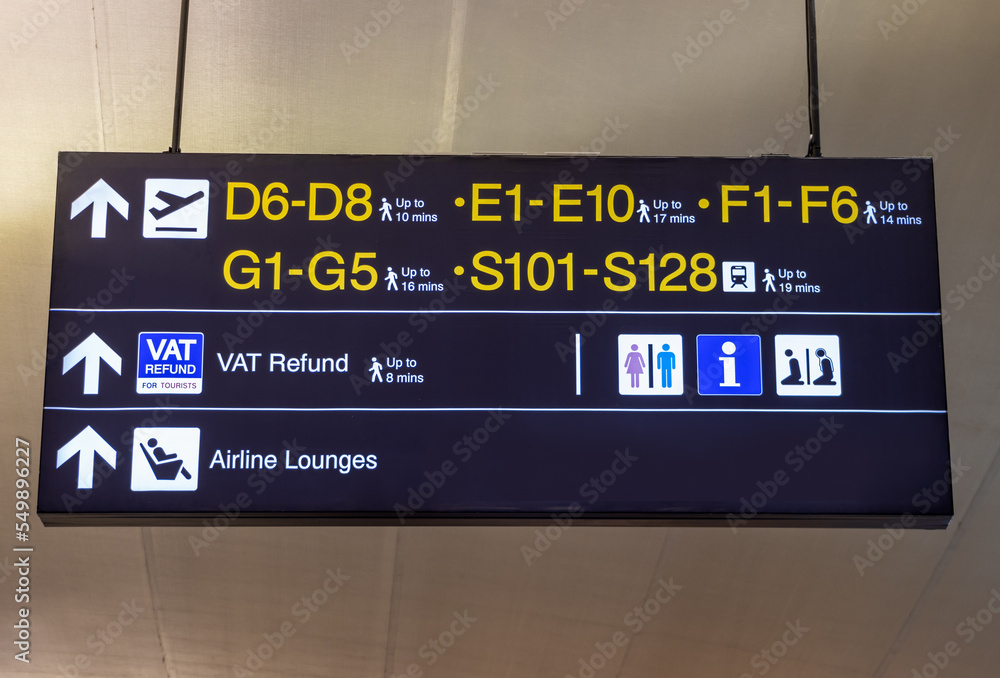 Information directional boards hanging in the airport hall.