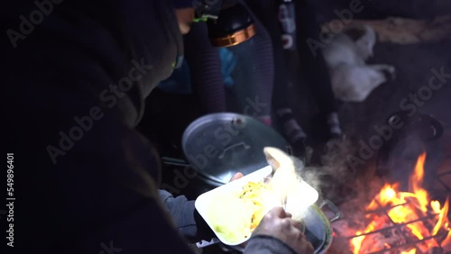 Making food in the cold weather on top of the Acatenango Volcano photo