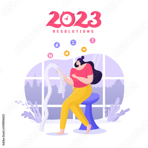 New years resolution and goals. young woman with pen writes goals and resolutions for new year.