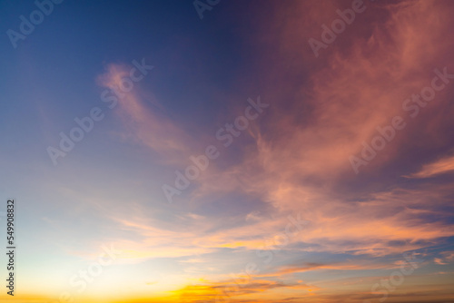 Beautiful dramatic and colorful sky at sunset over the mountains © Kittiphan
