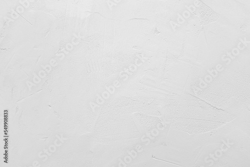 White cement or stone wall background and rough textured