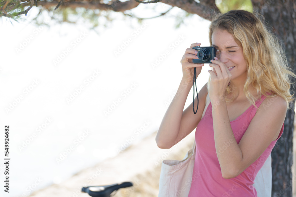 beautiful woman talking picture of seascape