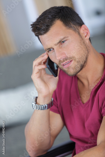 handsome man chatting on a mobile