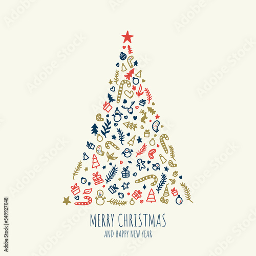 Greeting card concept with the words Merry Christmas. Abstract Christmas tree shape arranged with festive symbols